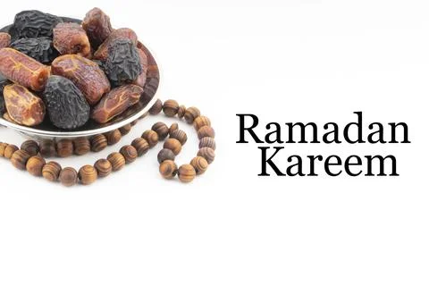 RAMADAN KAREEM text with Dates or kurma fruits and rosary beads or Tasbih on  写真素材