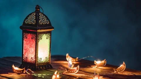 Ramadan Lantern with Colorful Light Glowing at Night and Glittering &amp; Bokeh Stock Footage 128697484