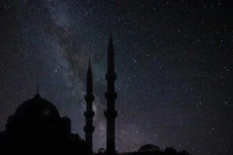 Ramadan or islamic concept image. Silhouette of a mosque and milky way Stock Photos