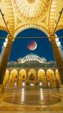 Ramadan or islamic concept image. Suleymaniye Mosque and eclipsed moon Stock Photos
