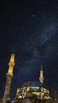 Ramadan or islamic vertical background photo. Eyup Sultan Mosque with milkyway Stock Photos