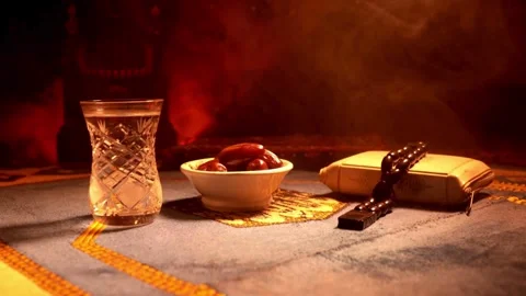 Ramadan prayer setting with prayer beads and dates Stock Footage 334137328