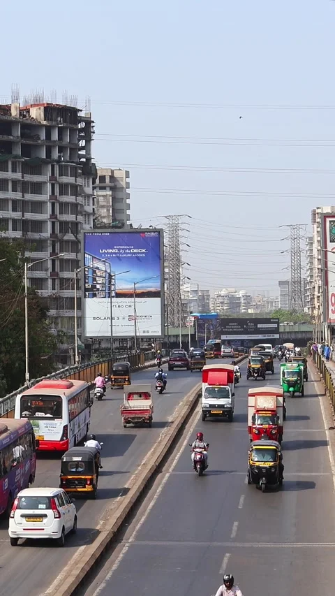 Ramakrishna Chemburkar Marg bridge traffic cityscape in Mumbai Stock Footage 332698006