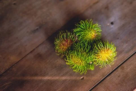 Rambutan, placed on the table Stock Photos