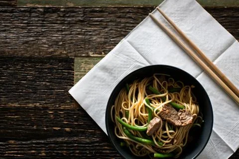 Ramen with beef and egg noodles in bowls Stock Photos