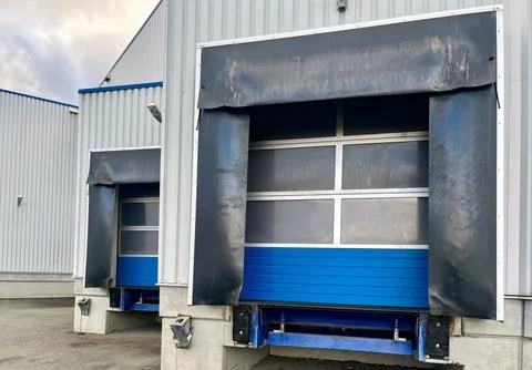 Ramp for loading cargo into semi-trailers of trucks. Ramp for unloading cargo Stock Photos