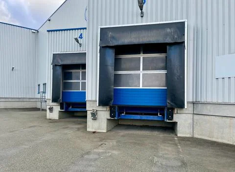 Ramp for loading cargo into semi-trailers of trucks. Ramp for unloading cargo Stock Photos