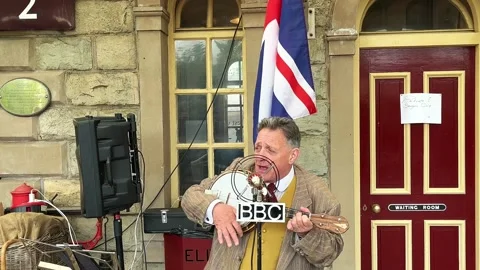 Ramsbottom UK 27 May 2024; 1940s Steam train celebration event. 4k video Stock Footage 276368816