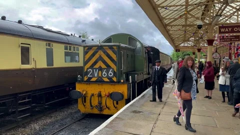 RAMSBOTTOM UK. 27 May 2024; 1940s Steam train celebration event. 4K Video Stock Footage 276368975