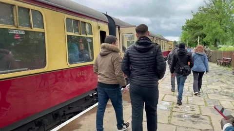 Ramsbottom UK 27 May 2024; 1940s Steam train celebration event. 4k video Stock Footage 276369002