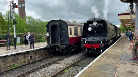 Ramsbottom UK 27 May 2024; 1940s Steam train celebration event. Stock Footage 276369030
