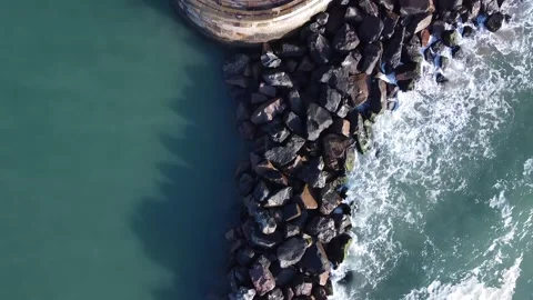 Ramsgate Harbour and waves crashing on break water Stockbeeldmateriaal 153541234