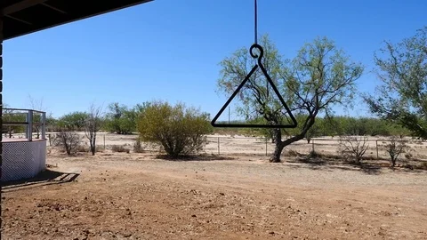 Ranch dinner bell triangle Stock Footage 76775366