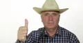 Ranch Farmer Wearing Cowboy Hat Satisfied Good Sales Thumbs Up Confident Face 4k or 4k+ Resolution