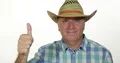 Ranch Farmer Wearing Cowboy Hat Satisfied Good Sales Thumbs Up Confident Face 4k or 4k+ Resolution