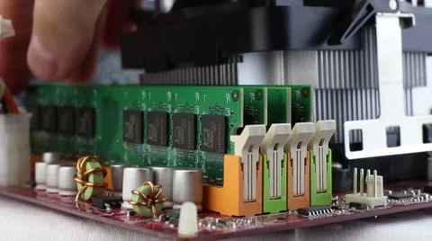 Random access memory installing on a motherboard Stock Footage 59784871