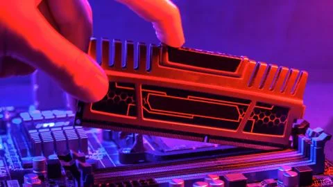 Random access memory.strip inserted into the motherboard. Motherboard out-of- Stock Photos