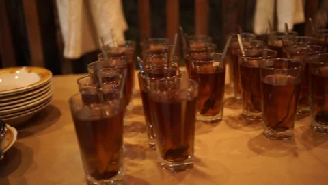 Random Arrangement of Iced Tea Glasses on a Table 스톡 동영상 343588286