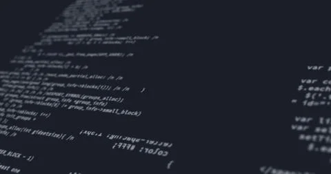 Random computer codes projected on the screen while being written or typed Stock Photos