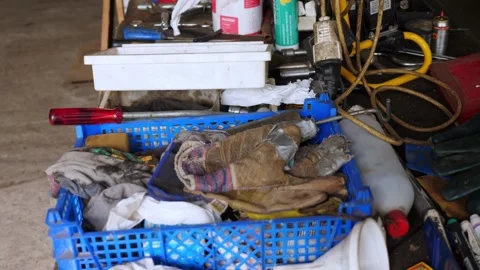 Random itens in old garage on workbench Stock Footage 195999491