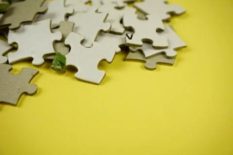 Random jigsaw puzzle incomplete concept background. Corner pile puzzle copy s Stock Photos