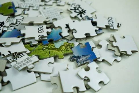 Random jigsaw puzzle incomplete concept background Stock Photos