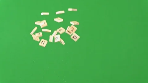 Random letter tiles being projected up and falling; slow motion; green screen 動画素材 100657500