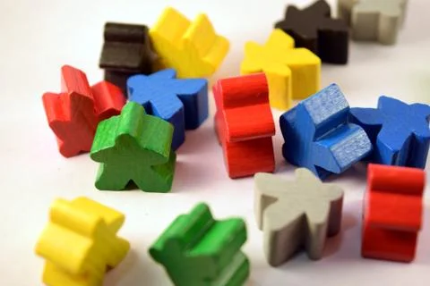 Random meeples on a white background Stock Photos