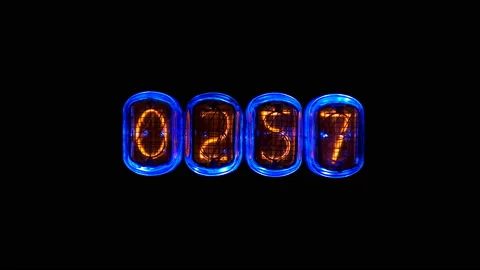 Random numbers change on the numerical counter, on Gas discharge indicator Stock Footage 104442907