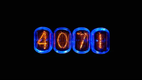 Random numbers change on the numerical counter, on Gas discharge indicator Stock Footage 104468517