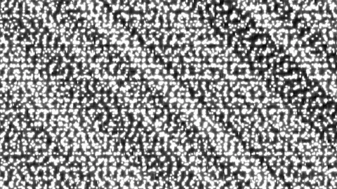 A random pattern of speckles and contrasts in black and Stock Footage 339454056