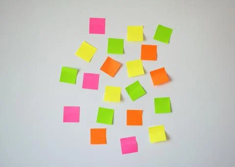 Random Placed Colorful Sticky Notes on White Wall for Planning and Brainstorming Stock Photos