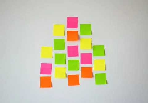 Random Placed Colorful Sticky Notes on White Wall for Planning and Brainstorming Stock Photos