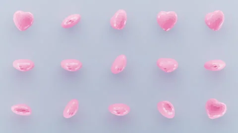 Random rotating pinky 3d hearts pattern Stock Footage 297761297
