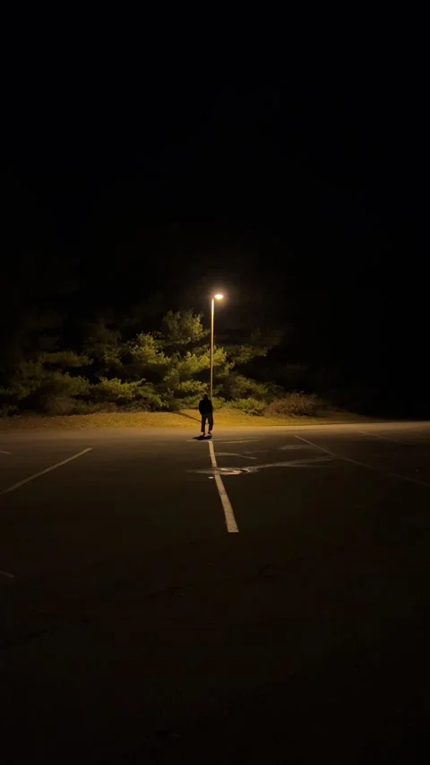 Random self shot of me walking under a lamppost Stock Footage 170890537