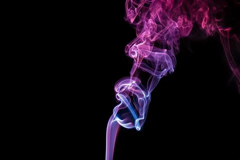 Random shapes of colored smoke fired with colored flash Stock Photos