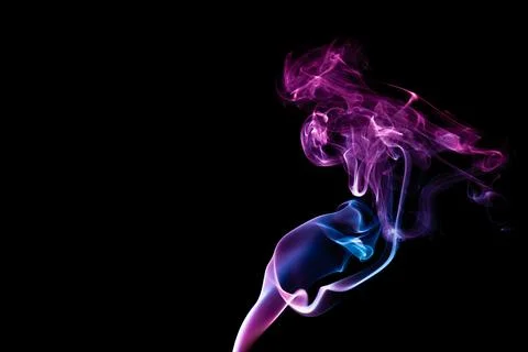 Random shapes of colored smoke fired with colored flash Stock Photos