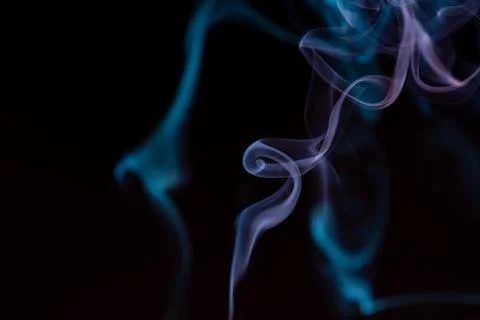 Random shapes of colored smoke fired with colored flash Foto stock
