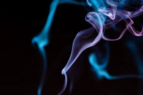 Random shapes of colored smoke fired with colored flash Stock Photos
