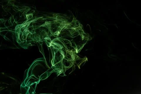 Random shapes of colored smoke fired with colored flash Stock Photos