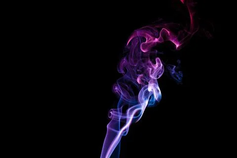 Random shapes of colored smoke fired with colored flash Stock Photos