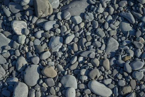 Random size river stone background.Nature river stone. Stock Photos