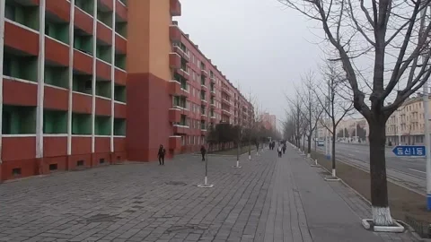 Random street scene in Pyongyang, North Korea Stock Footage 325307606