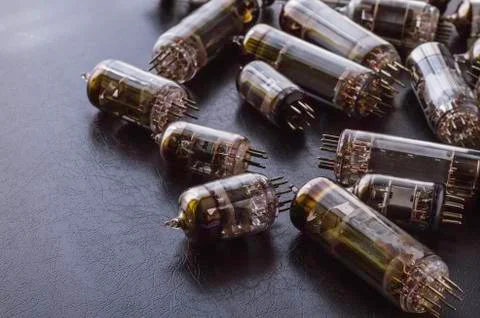Random vacuum tubes on a black background. Stock Photos