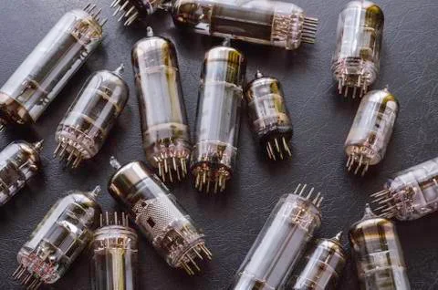 Random vacuum tubes on a black background. Stock Photos
