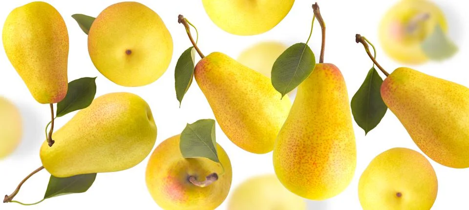 Randomly falling pears.Macro isolated pears on a white background Stock Photos
