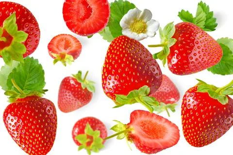 Randomly falling strawberries on a white background Stock Photos