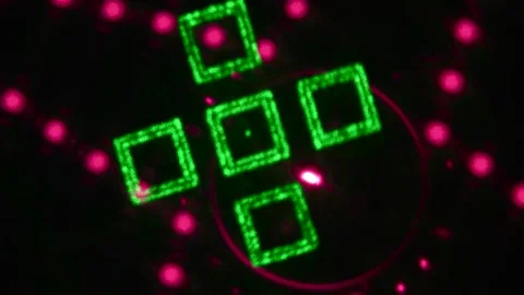 Randomly moving multi-colored figures and rays of green and pink Stock Footage 244481312