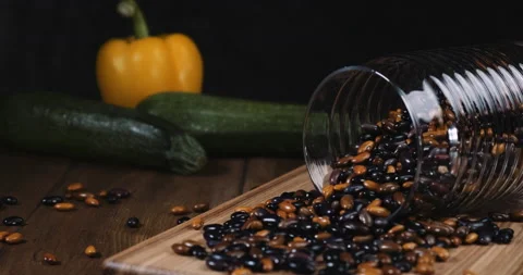 Range of different types of beans on table. slider video. Vídeos de archivo 160666002