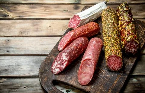 The range of different types of salami. Stock Photos